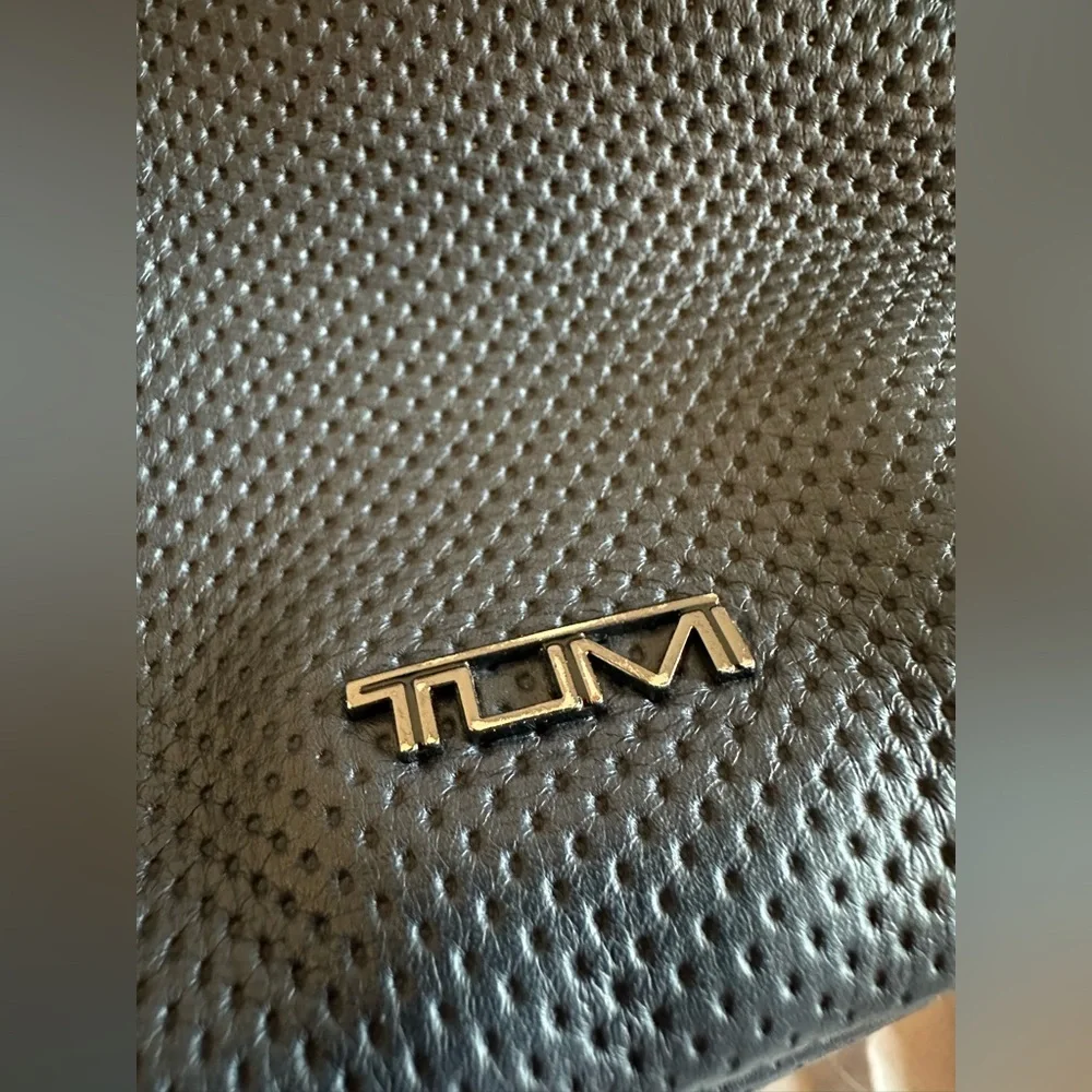 Tumi Navy Perforated Leather Backpack with Tan Handles